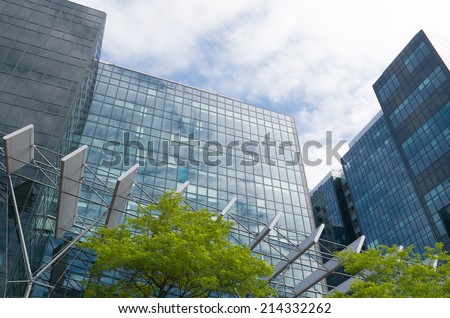 AMSTERDAM - JUNE 7, 2014: One of the towers of the World Trade Center Amsterdam. It is a commercial center in the Amsterdam South Axis with more than 125,000 square meter of office space.