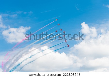 GILZE-RIJEN, NETHERLANDS - JUNE 21, 2014: Royal Air Force stunt team red arrows in action on the Royal Dutch Air Force days 2014.