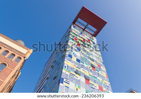DUSSELDORF - SEPTEMBER 6, 2014: Colorium building in the media harbor district. A once-industrial harbor finds its future in a new landmark woven with a tapestry of color, designed by Alsop Architects