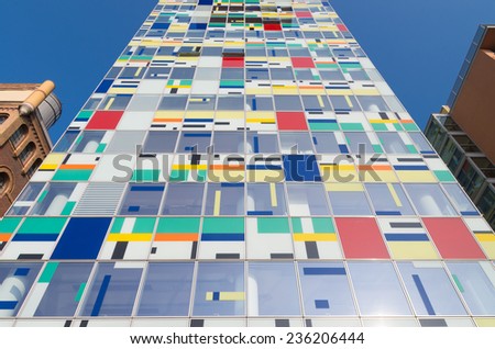 DUSSELDORF - SEPTEMBER 6, 2014: Colorium building in the media harbor district. A once-industrial harbor finds its future in a new landmark woven with a tapestry of color, designed by Alsop Architects