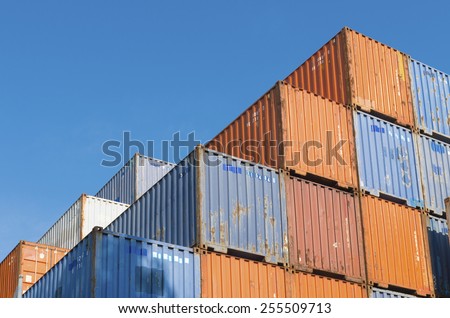 Piled up cargo containers in the rotterdam port. It is the largest port in Europe, covering 105 square kilometers (41 sq miles)