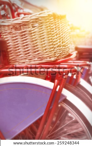 red bike with nostalgic reed basket, instagram filtered