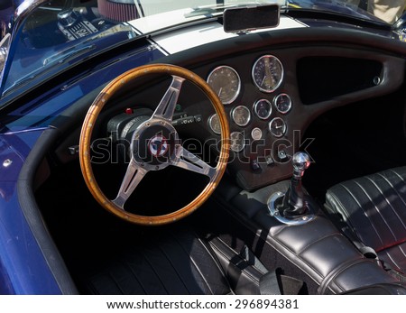 OLDENZAAL, NETHERLANDS - APRIL 27, 2015: Interior of an oldtimer car during the 14th orange tour.