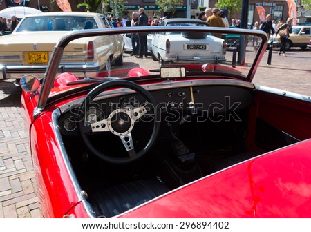 OLDENZAAL, NETHERLANDS - APRIL 27, 2015: Interior of an austin healey oldtimer during the 14th orange tour.