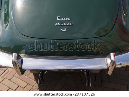OLDENZAAL, NETHERLANDS - APRIL 27, 2015: Back of a jaguar e-type during the 14th orange tour. This annual tour takes places during the king\'s birthday celebrations, a national holiday.