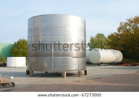 shiny silo stored outside for further processing