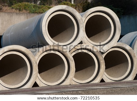 concrete drainage pipes in the street