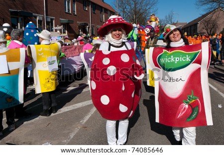 OLDENZAAL, NETHERLANDS - MARCH 6: People joining the carnival parade dressed like tea-bags on March 8, 2011 in Oldenzaal, Netherlands.