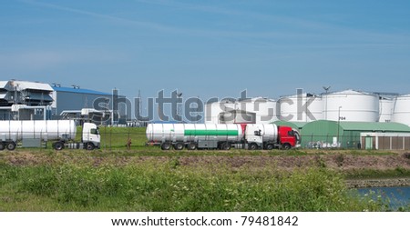 tanker trucks waiting to get loaded with fuel