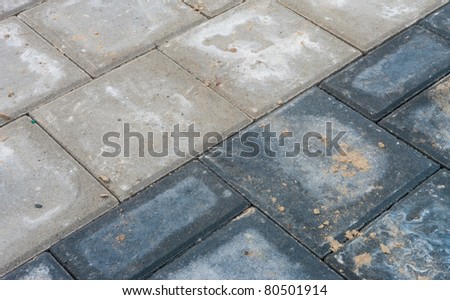 newly paved street paved with concrete bricks