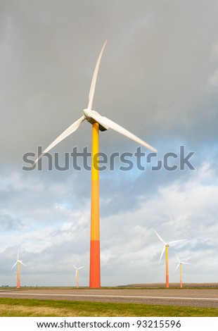 windmill farm with colorful windmills in Almere, netherlands