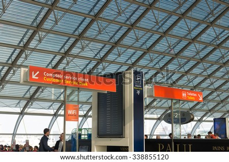 PARIS - JUNE 11, 2015: Customer service desk at the Roissy Charles de Gaulle International Airport (CDG). In 2013, the airport handled 62,052,917 passengers and 497,763 aircraft movements