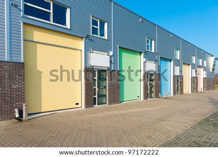 business units for small companies with colorful roller doors