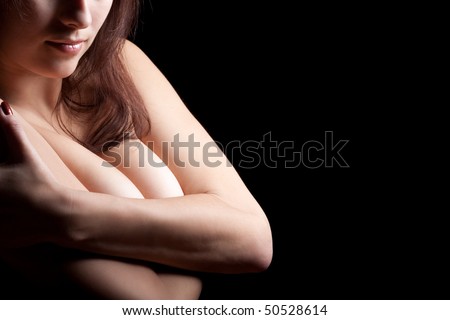 stock photo Torso of naked woman shading breast with hands
