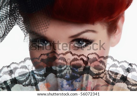 Portrait of lady eyes with hand fan and lashes! Isolated on white background!