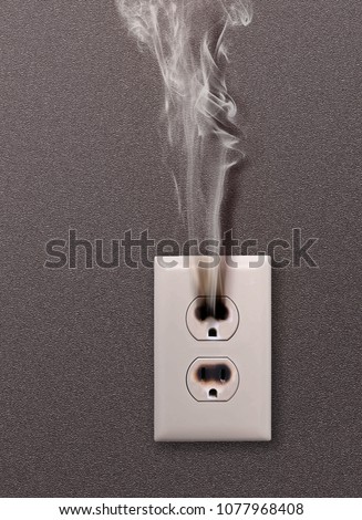 white household socket has burned from short circuit