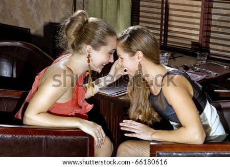 stock-photo-two-happy-girl-friends-talk-and-drink-at-restaurant-66180616.jpg