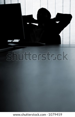 Man relaxing in front of the computer