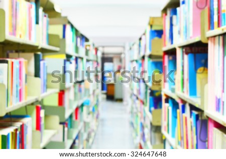 Bookshelf in library blurred for background