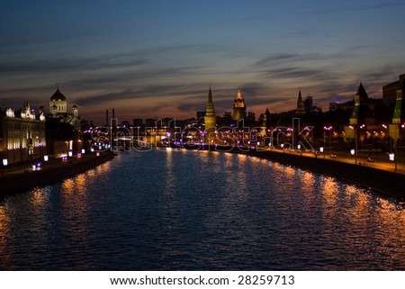 embankment of moscow river in the evening illumination