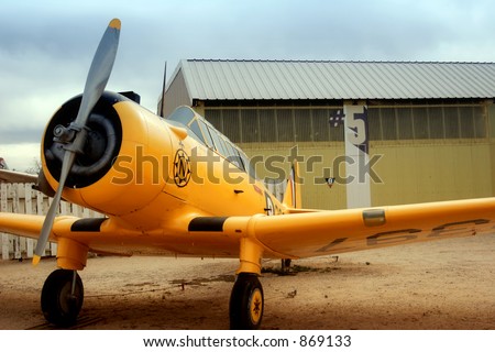 Historic Fighter Plane in front of hangar