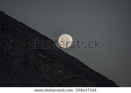 Full moon rises above Volcan Telica
