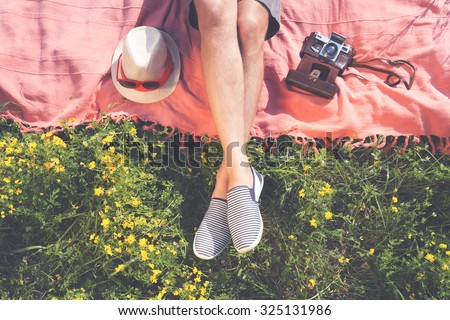 Relaxing in a meadow in the summer sun.