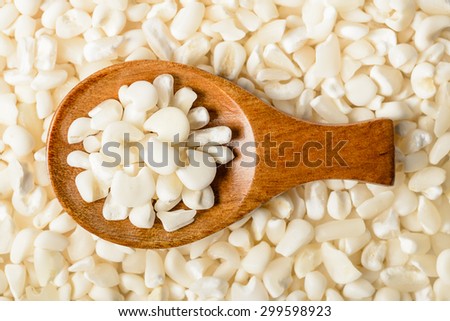 food background of raw white corn grits