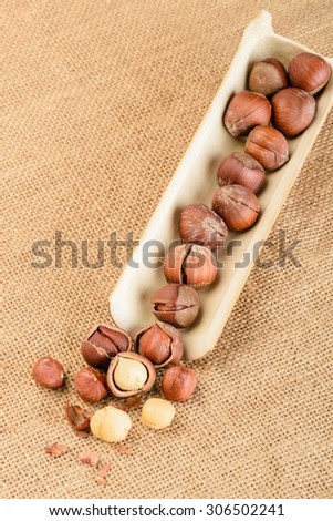 dried hazelnut in the bamboo plate