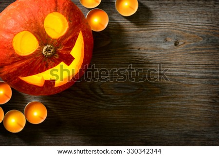 jack o lantern, pumpkin lantern on the wooden board