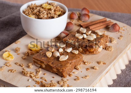 oat bar on wooden board, close-up
