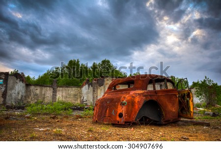 Abandoned car.Old retro car at the junkyard