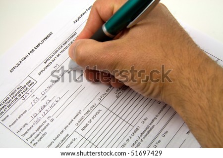 A general employment application being filled out.