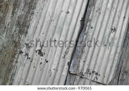 bent and worn corrugated metal