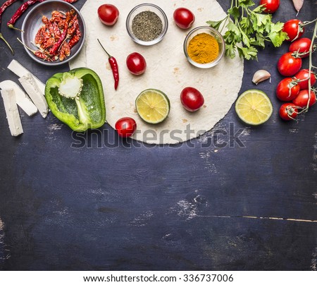 sliced vegetables on tortilla, Ingredients for cooking burritos border with text area on wooden rustic background top view horizontal