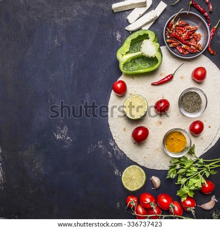 sliced vegetables on tortilla, Ingredients for cooking burritos border with text area on wooden rustic background top view  vertical