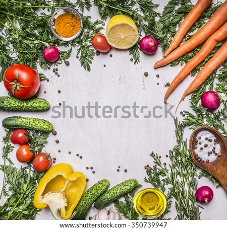 Colorful various of organic farm vegetables lined frame on wooden rustic background top view place for text