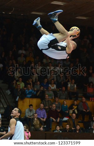 KAPOSVAR, HUNGARY - DECEMBER 22: An unidentified player in action at FACE TEAM Acrobatic Basketball Show, December 22, 2012 in Kaposvar, Hungary