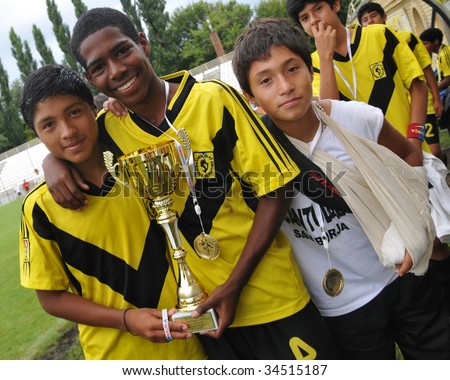 KAPOSVAR, HUNGARY - JULY 24: The winner Peruvian players celebrate at V. Youth Football Festival Under 13 Final - Cantolao (PER) vs Pecsi MFC (HUN) - July 24, 2009 in Kaposvar, Hungary