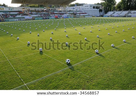 KAPOSVAR, HUNGARY - JULY 23: Many balls at the Guinness world record breaking attempt (Most people keep the football in the air Juggling together) - July 23, 2009 in Kaposvar, Hungary