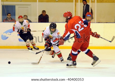 KAPOSVAR, HUNGARY - NOVEMBER 6: Unidentified players in action at the friendly ice hockey match with Hungarian and Russian Youth National Team, November 6, 2009 in Kaposvar, Hungary.