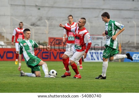 KAPOSVAR, HUNGARY - MAY 20: Unidentified players in action at a Hungarian National Championship soccer game Kaposvar vs. Diosgyor - May 20, 2010 in Kaposvar, Hungary.