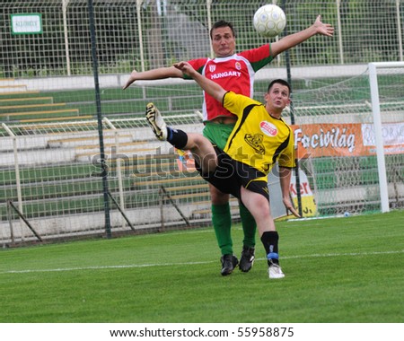 KAPOSVAR, HUNGARY - JUNE 19: Unidentified players in action at a Somogy County Championship II. final game Labod vs. Sagvar - June 19, 2010 in Kaposvar, Hungary.