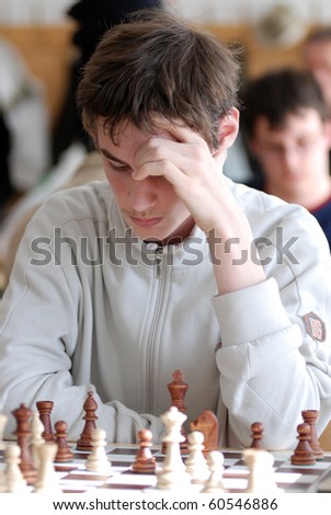 KAPOSVAR, HUNGARY - FEBRUARY 18: Unidentified chess player concentrates at the Hungarian National Championship I/B. chess competition between Kaposvar and Decs February 18, 2007 in Kaposvar, Hungary.