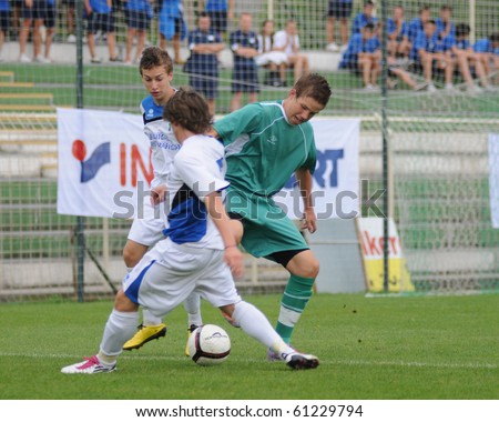 KAPOSVAR, HUNGARY - JULY 24: Milan Mayer (in green) in action at the V. Youth Football Festival Under 17 Final Rakoczi FC (HUN) vs Brescia Academy (ITA) July 24, 2010 in Kaposvar, Hungary