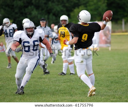 KAPOSVAR, HUNGARY - MAY 20: Unidentified players in action an American football game Goldenfox vs. Budapest Cowboys, May 20, 2007 in Kaposvar, Hungary.