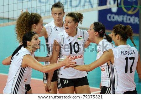 SZOMBATHELY, HUNGARY - JUNE 3: Hungarian players celebrate at a CEV European League woman\'s volleyball game Hungary vs Bulgaria on June 3, 2011 in Szombathely, Hungary.