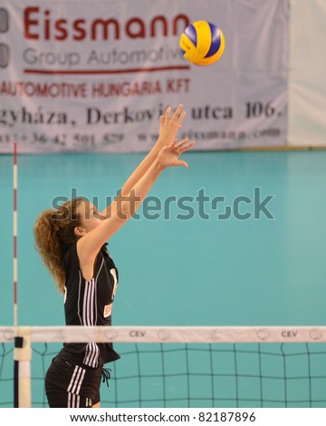 DEBRECEN, HUNGARY - JULY 9: Júlia Milovits (in black 18) in action a CEV European League woman's volleyball game Hungary (black) vs Israel (white) on July 9, 2011 in Debrecen, Hungary.