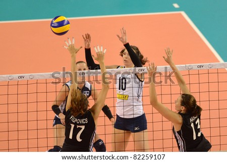 DEBRECEN, HUNGARY - JULY 9: Anita Filipovics (in black 17) in action a CEV European League woman\'s volleyball game Hungary (black) vs Israel (white) on July 9, 2011 in Debrecen, Hungary.