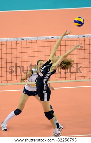 DEBRECEN, HUNGARY - JULY 9: Julia Milovits (in black 18) in action a CEV European League woman\'s volleyball game Hungary (black) vs Israel (white) on July 9, 2011 in Debrecen, Hungary.